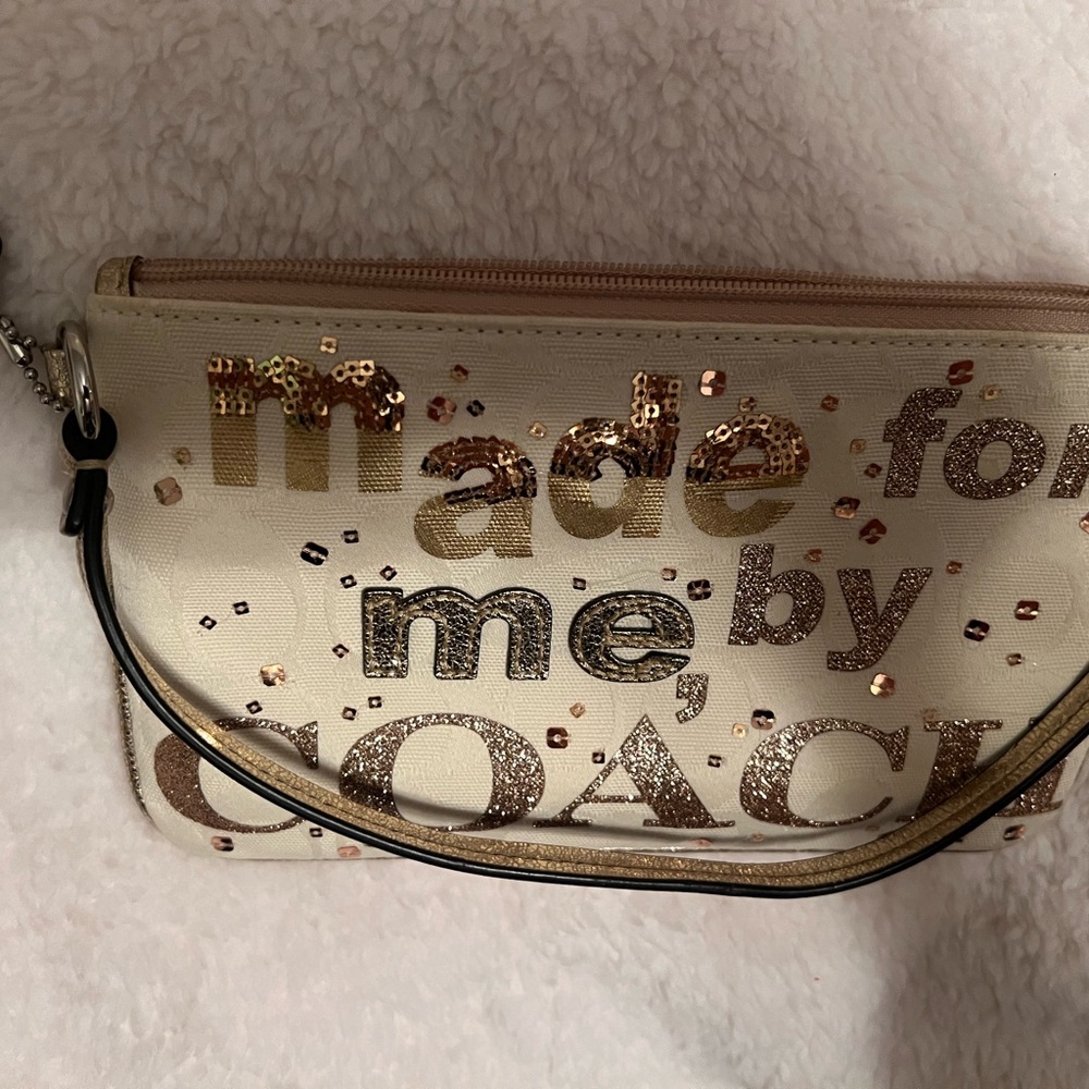 Coach Cream and Gold Wristlet with Glitter Accents